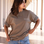 Woman wearing beige cute crewneck 