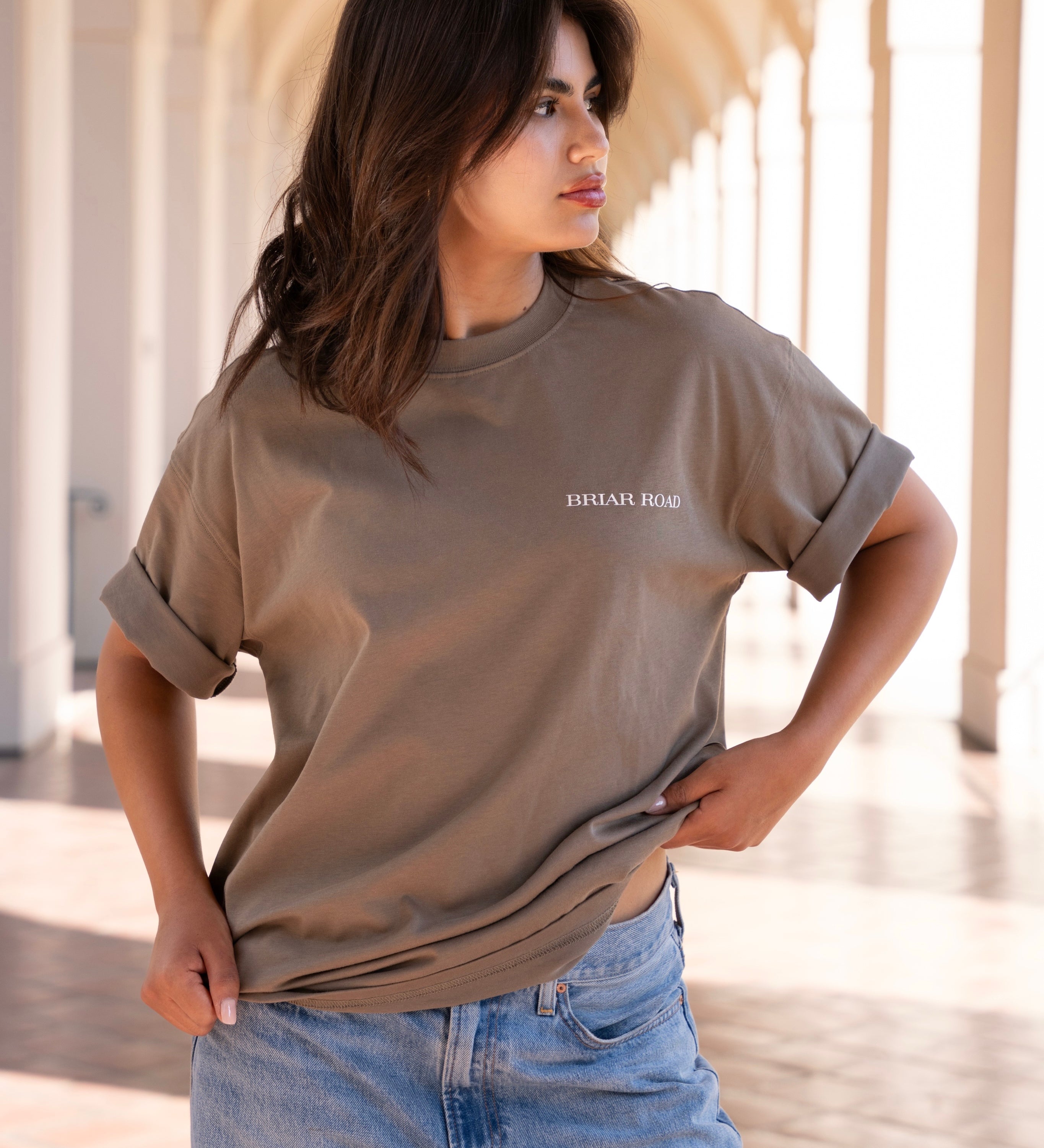 Woman wearing beige cute crewneck 