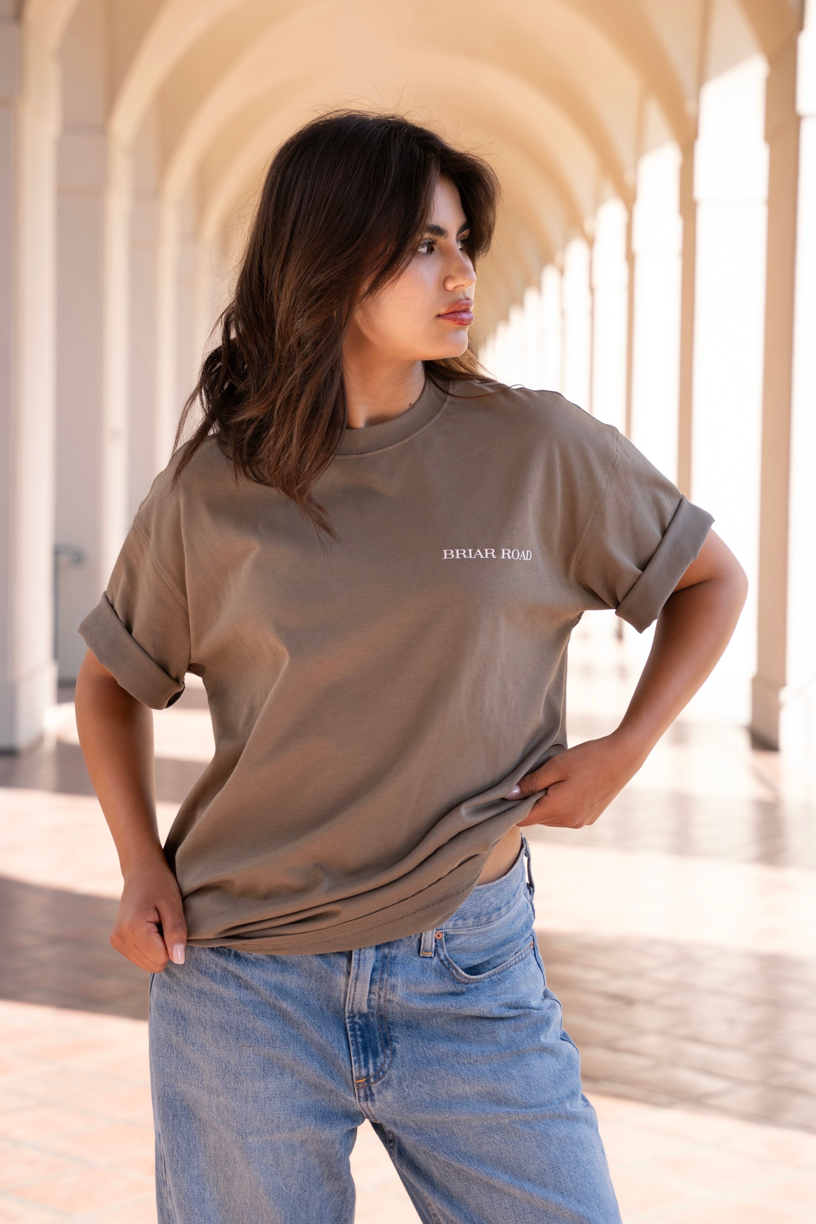 Woman wearing beige cute crewneck 
