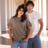 Man wearing varsity crewneck and woman wearing oversized crewneck