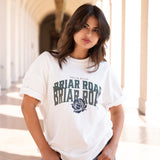 Woman wearing white oversized crewneck with Briar Road branding